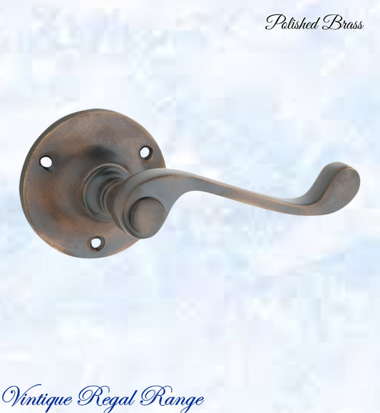 Antiqued Brass Round Rose base/ Wave lever door handle 68mm dia-Vintique Concepts