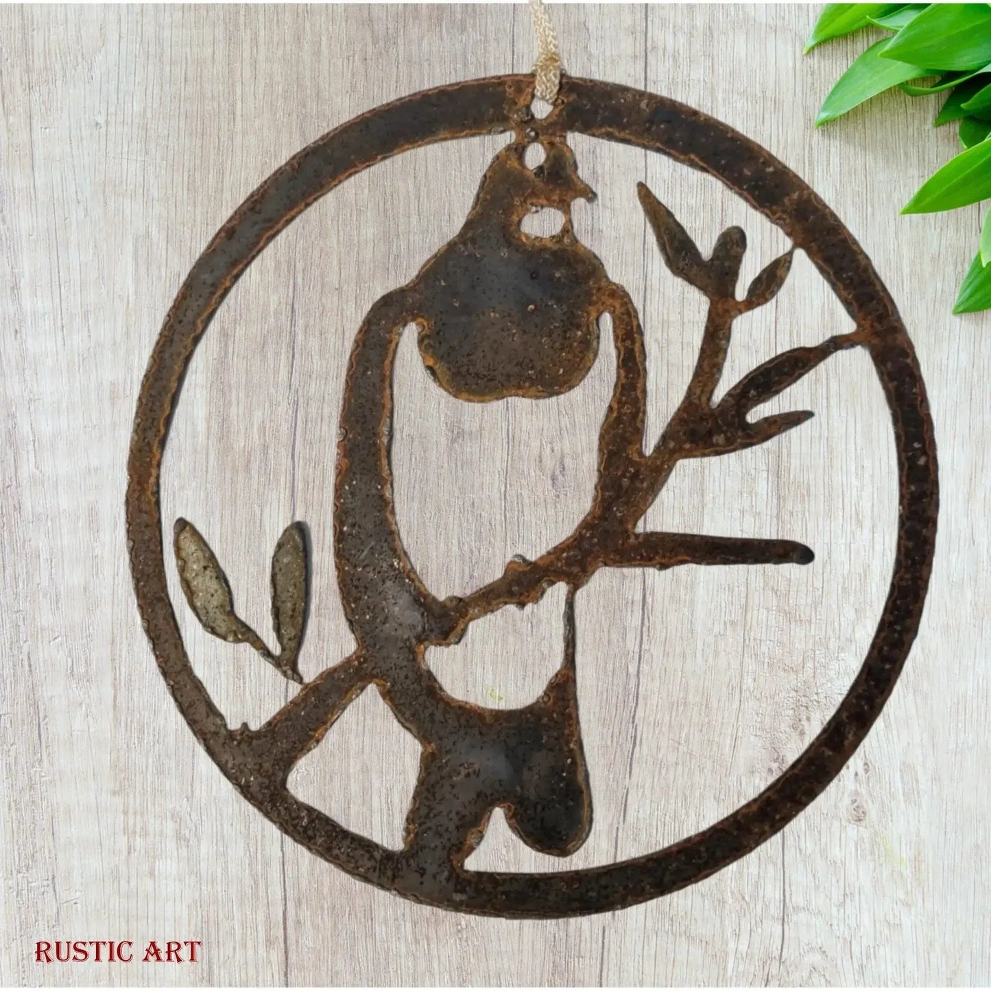 Hanging Rusty Metal Bird KERERU in Circle 200mm Diameter - Vintique Concepts