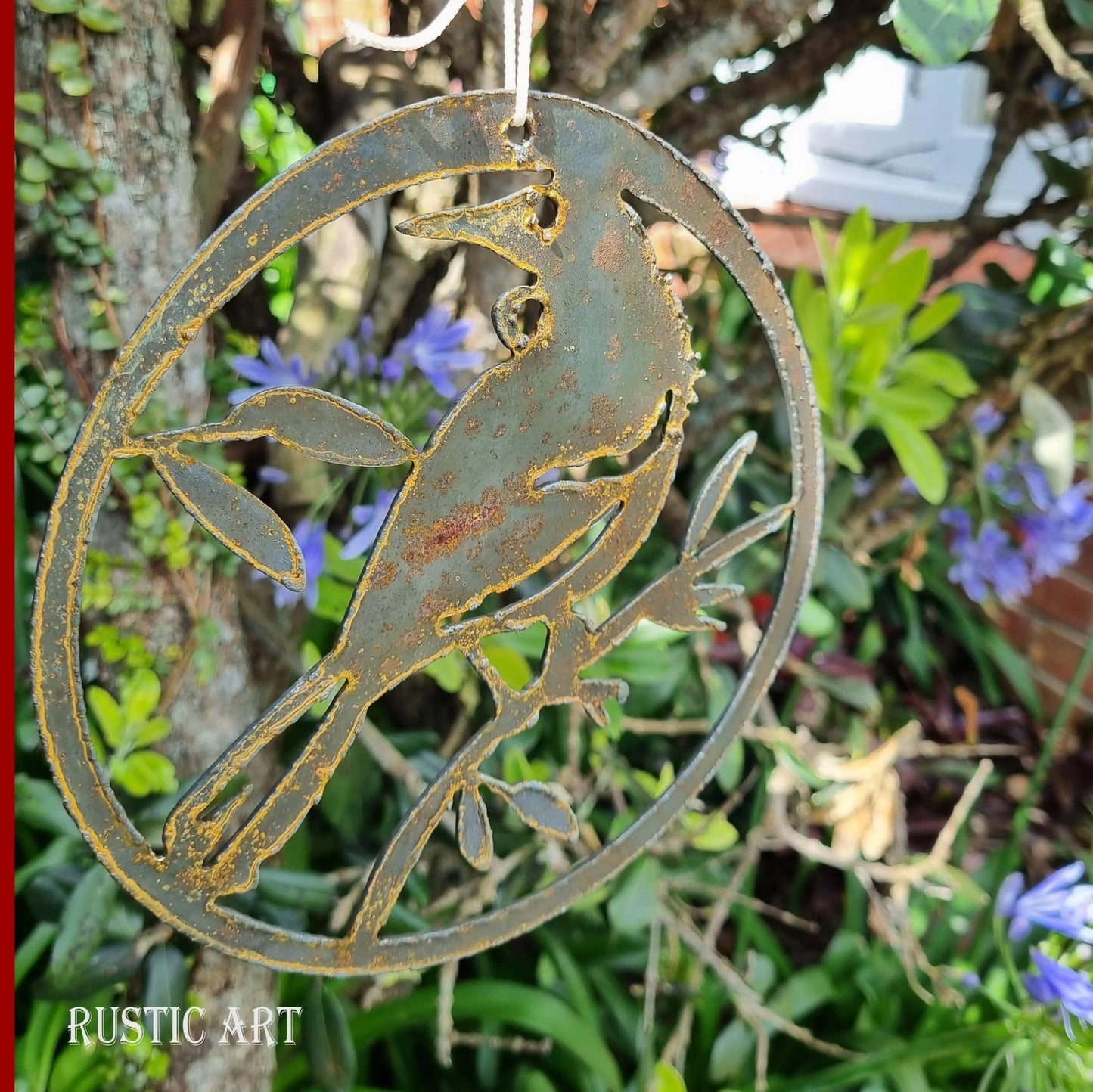 hanging Rusty Metal Bird TUI in circle approx 180mm in dia-Vintique Concepts