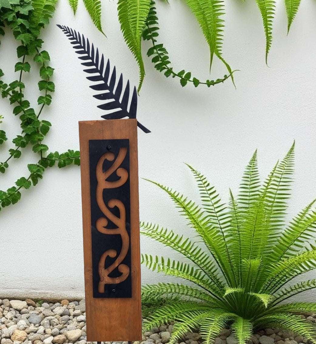 Black Metal Garden Art NZ Huruwhenua (Silver Fern) on Rustic Oak Post - Vintique Concepts