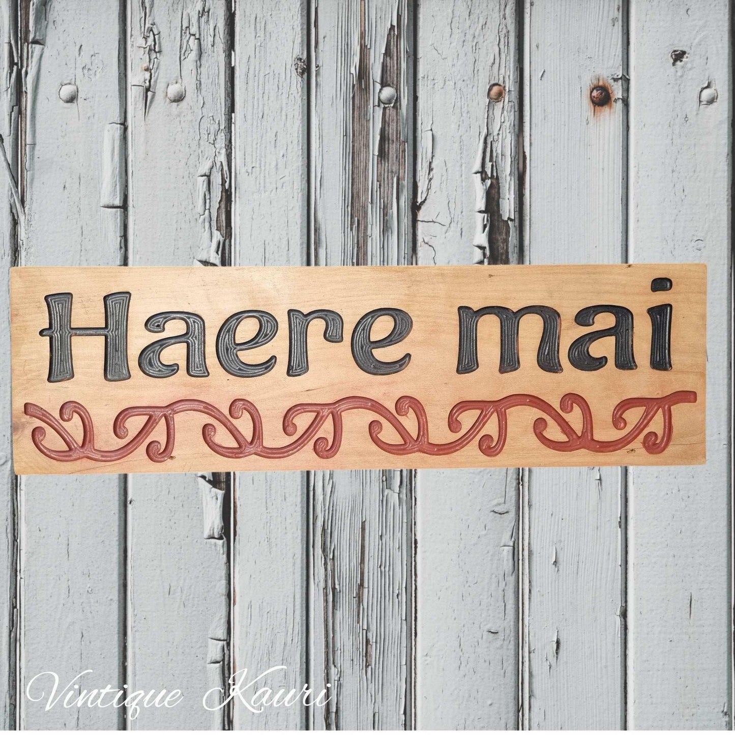 Carved wooden Kauri sign "Haere Mai"665mm x 195mm - Vintique Concepts