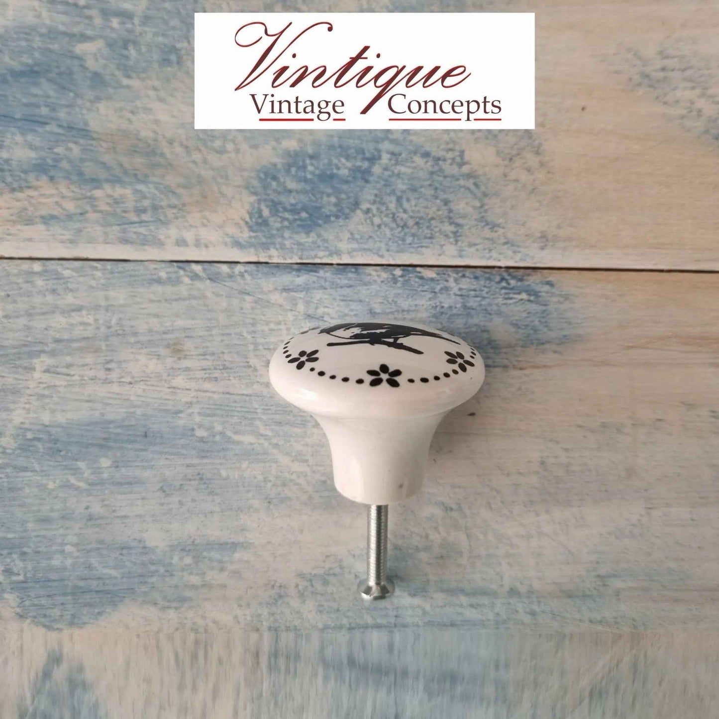 White Ceramic Cabinet Knob Bird on a branch 35mm Dia