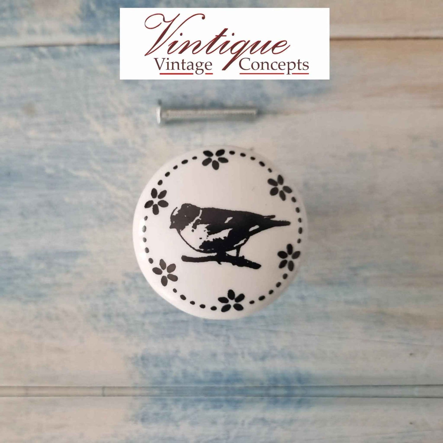 White Ceramic Cabinet Knob Bird on a branch 35mm Dia