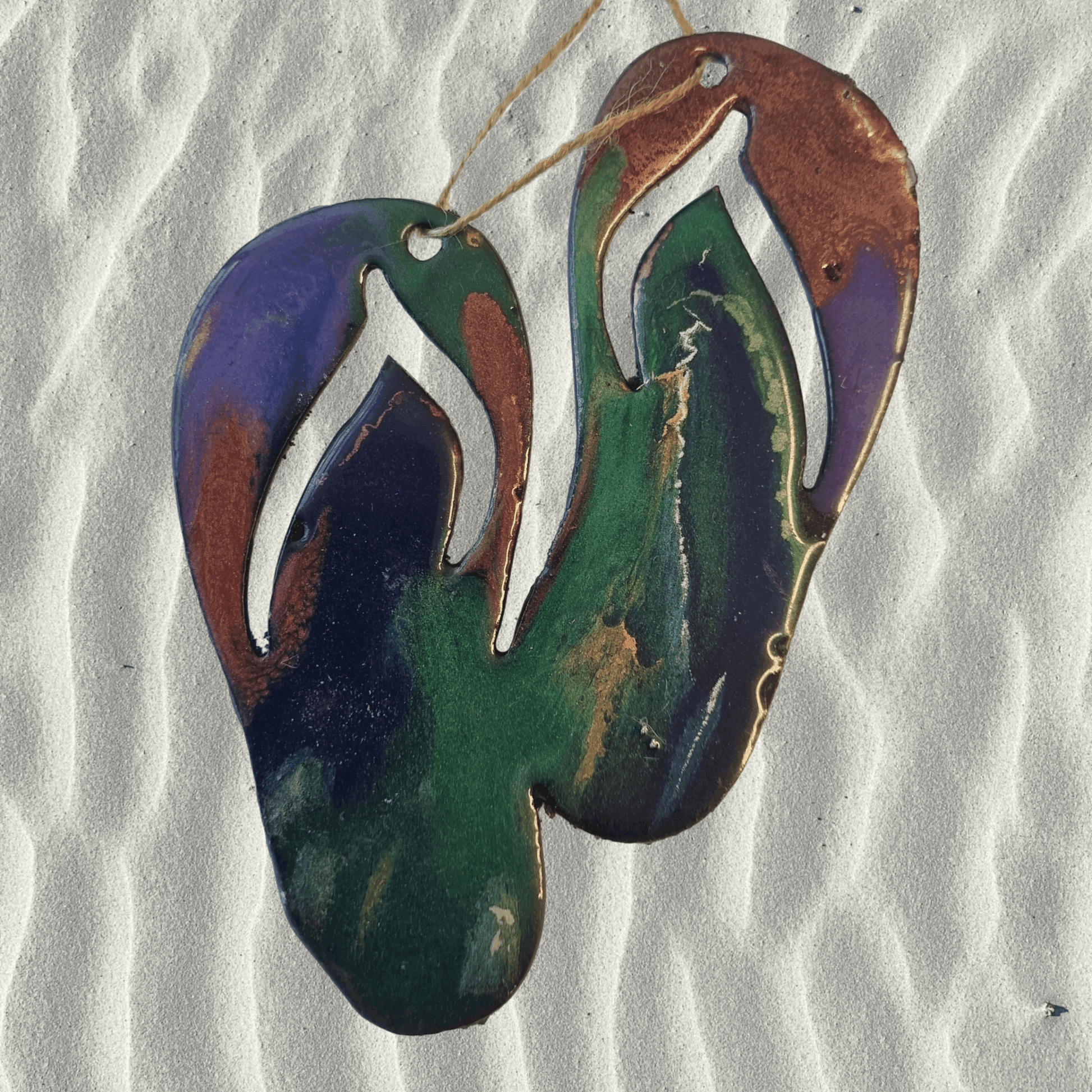 Jandals metal art coated in pourable epoxy 130,mm x 160mnm