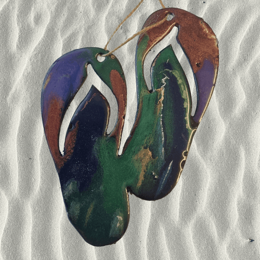 Jandals metal art coated in pourable epoxy 130,mm x 160mnm