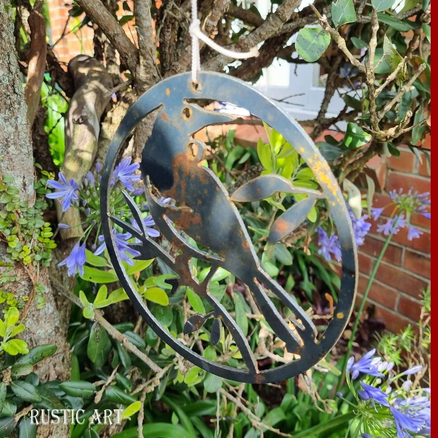 hanging Rusty Metal Bird TUI in circle approx 180mm in dia-Vintique Concepts
