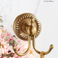 "Cordia" Sovereign robe hook Antiqued brass