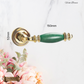 Verde Sovereign Door lever handle Pol Brass/Green effect