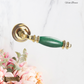 Verde Sovereign Door lever handle Pol Brass/Green effect
