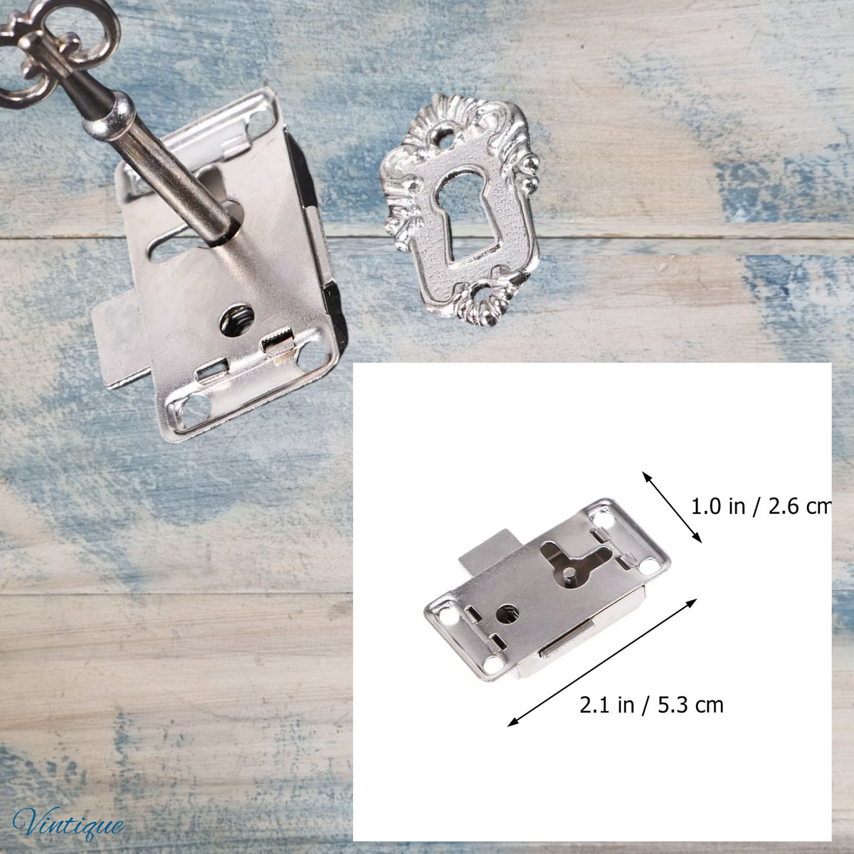 Antique silver latch lock set with key and escutcheon on a wooden background, dimensions shown in inset.