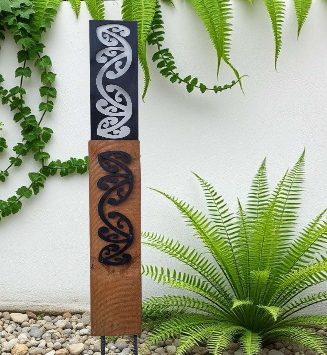 Black metal Koru pattern on Rustic Oak Post-Garden Art-Vintique Concepts
